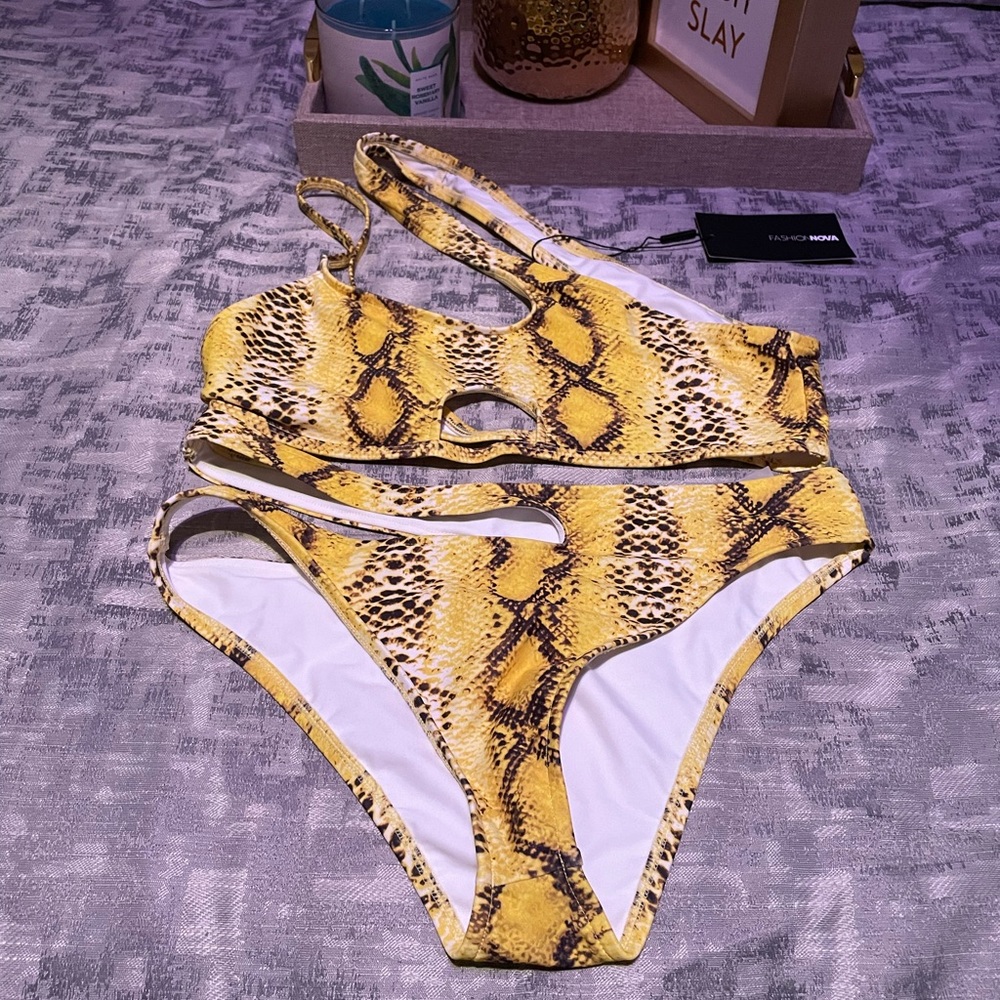 Yellow 2 piece bikini, gently used. Worn once but is too small